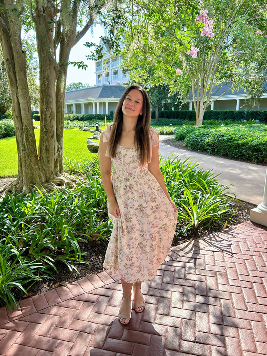 Woman's blush floral midi dress