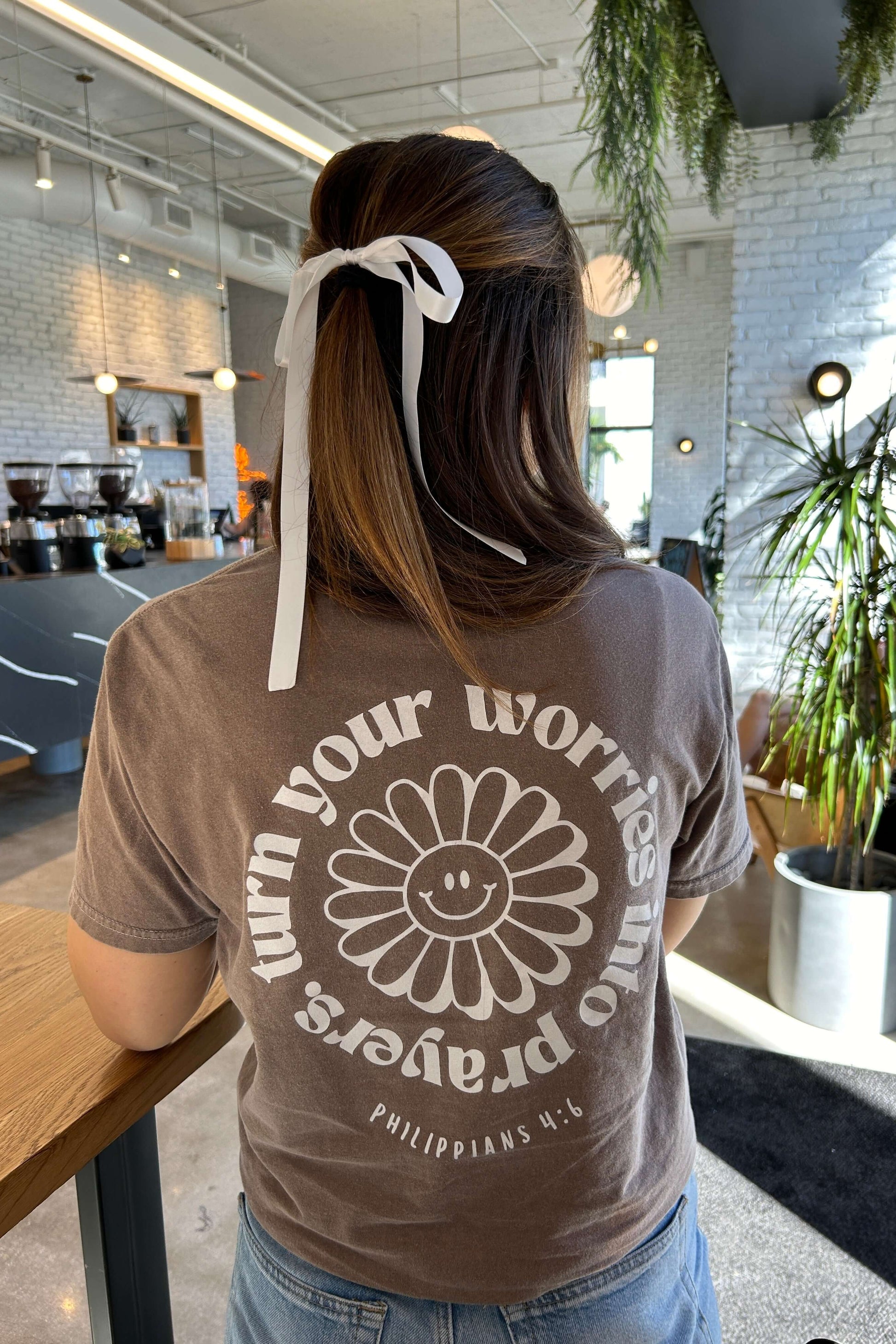 Turn your worries into prayers graphic tee shirt