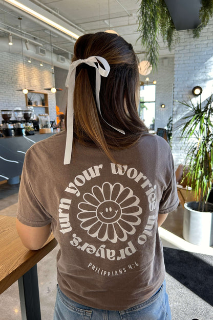 Turn your worries into prayers graphic tee shirt